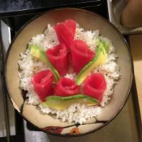 03. Tekka Don · Slices of raw tuna over sushi rice. 