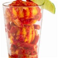 Mangonada · Mango sorbet, Takis, Tajin seasoning, chamoy sauce and lime.