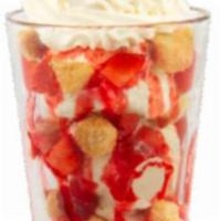 Strawberry Bond Creation · Vanilla Bean ice cream, cheesecake bites and strawberry sundae.