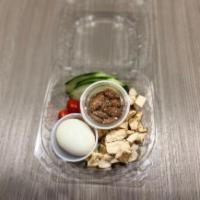 Protein Box · Grilled chicken, boiled egg, cucumber, tomato grapes and toasted almonds.