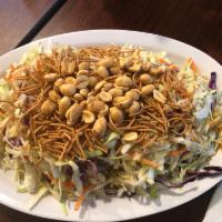 Chicken Chinese Salad · Cabbage, carrots, crispy noodles, green onions, peanuts, sesame seed dressing.