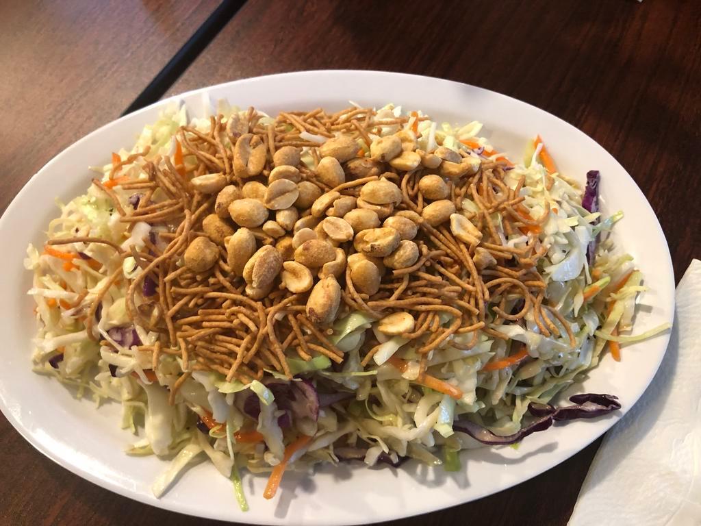 Chicken Chinese Salad · Cabbage, carrots, crispy noodles, green onions, peanuts, sesame seed dressing.