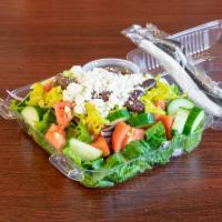 Greek Salad · Romaine lettuce, tomatoes, cucumbers, pepperoncinis, green peppers, red onions, and feta che...