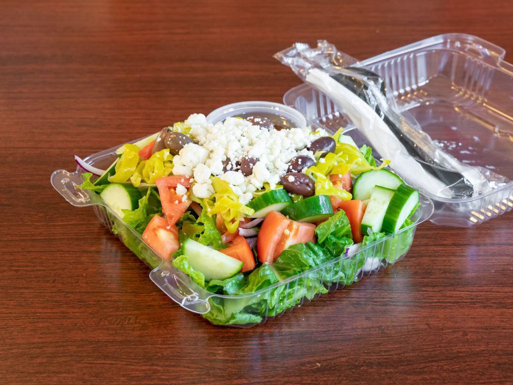 Greek Salad · Romaine lettuce, tomatoes, cucumbers, pepperoncinis, green peppers, red onions, and feta cheese tossed in a Greek vinaigrette.