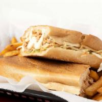 Chicken Chimi Dominicano · Dominican sandwich. Served with cabbage, mayo, ketchup, and tomatoes.