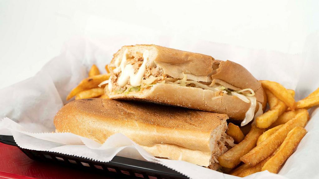Chicken Chimi Dominicano · Dominican sandwich. Served with cabbage, mayo, ketchup, and tomatoes.