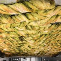 Pesto Parmesan Sourdough Twist · Our famous San Francisco Sourdough twisted with fresh pesto and Parmesan cheese served with ...