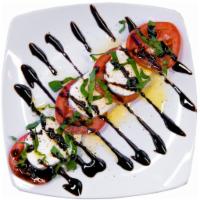 Caprese · Fresh mozzarella cheese, sliced Roma tomatoes, extra virgin olive oil and basil, drizzled wi...