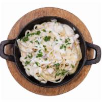 Fettuccine Alfredo · Our Creamy Alfredo Sauce Tossed with a Fettuccine Noodle, Chicken Breast, and topped with Fr...