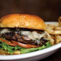Mushroom Swiss Burger · Onion, tomatoes, Swiss cheese and mushrooms. Served with fries.