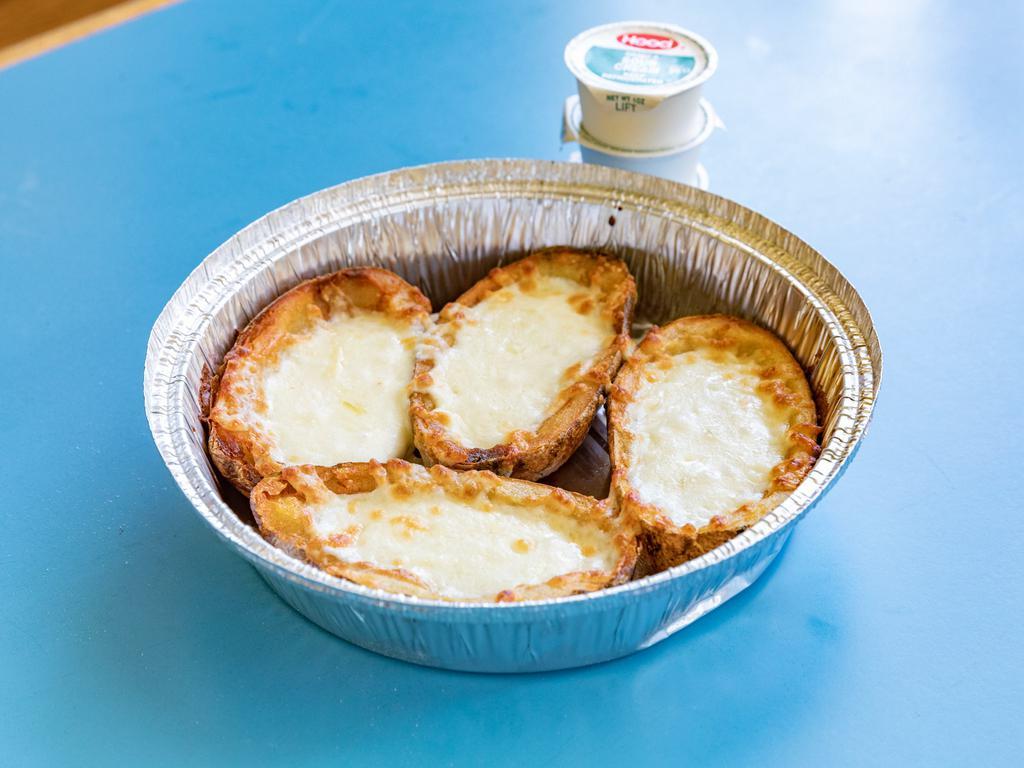 Potato Skins with Cheese · Potatoes that have been hollowed out and filled.