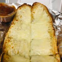 Garlic Bread with Cheese · A cross between garlic bread and pizza, cheesy bread is a quick, easy, and delicious party s...