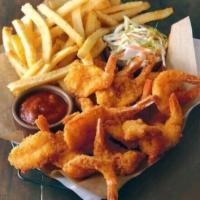 Shrimp Basket · 10 pieces breaded shrimp with french fries served with tartar sauce and coleslaw.