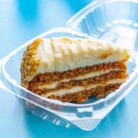 Carrot Cake · Moist cake, and spiced with cinnamon and frosted with cream cheese frosting.
