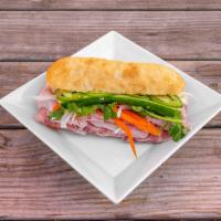 Z7T. Classic Banh Mi · Country ham, pate, demi baguette, pickled carrots and daikon, cilantro, scallions, cucumbers...
