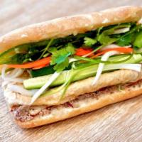 Z7P. Veggie Banh Mi · Fried tofu, veggie pate, demi baguette, pickled carrots and daikon, cilantro, scallions, cuc...