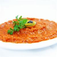 Eggplant Caviar · Roasted eggplant, tomatoes, bell peppers, onions, blended with oil and
spices. Served with 2...