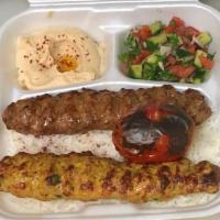 Chicken and Beef Lula Combo Plate · One skewer of grilled ground chicken and one skewer of grilled ground beef marinated with ou...