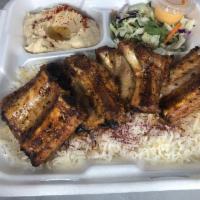 Baby-Back-Rib Kebab · Armenian style grilled pork ribs marinated in special spices served with rice, salad, hummus...