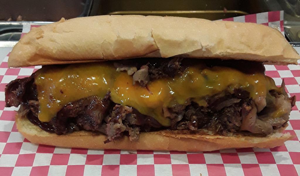 Smoke'n Mo · SMOKED BEEF BRISKET, BBQ SAUCE
CHEDDAR CHEESE ON A HOAGIE ROLL

