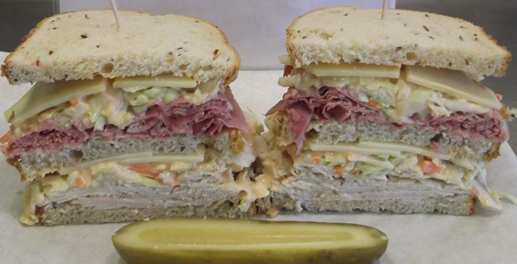 Sloppy Mo with Turkey Breast and Corned Beef · Double Decker sandwich. Corned Beef and Turkey Breast served cold on Rye with Coleslaw, Russian Dressing and Swiss cheese.