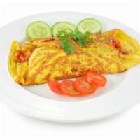 Cheese Omelette · Cheese lover's omelette with a mix of American, Swiss and cheddar cheese.