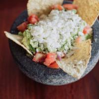 Fresh Made Guacamole · Served with diced tomatoes, onions, cilantro, lime juice.