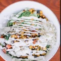 Burrito Bowl · White rice, lettuce, south western style corn mix, sour cream, queso fresco and your choice ...
