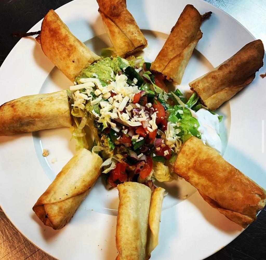 Flautas · 4 pieces. Chicken or beef, rolled dip fried on flour tortilla with salad.