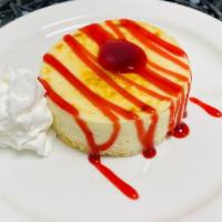 Sexy Cake · Vanilla bean creme brulee cheesecake with delicious raspberry sauce drizzled on top.  Oh and...