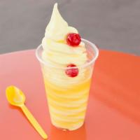 Pineapple Whip · Our pineapple whip Italian ice with Dole pineapple juice poured over it.  So refreshing!