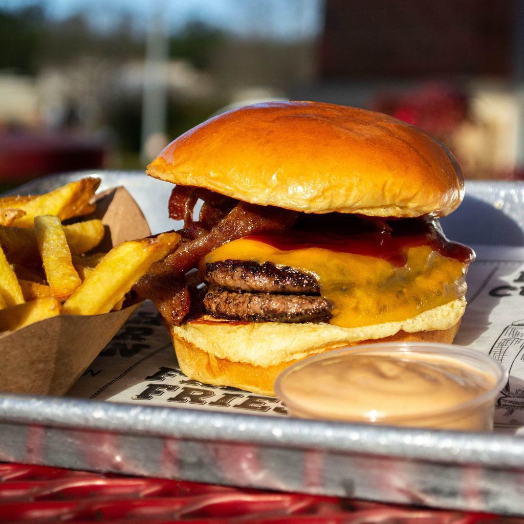 Smokehouse burger ·  1/3 lb. Bacon, cheddar cheese and Sweet Baby Ray's BBQ Sauce.