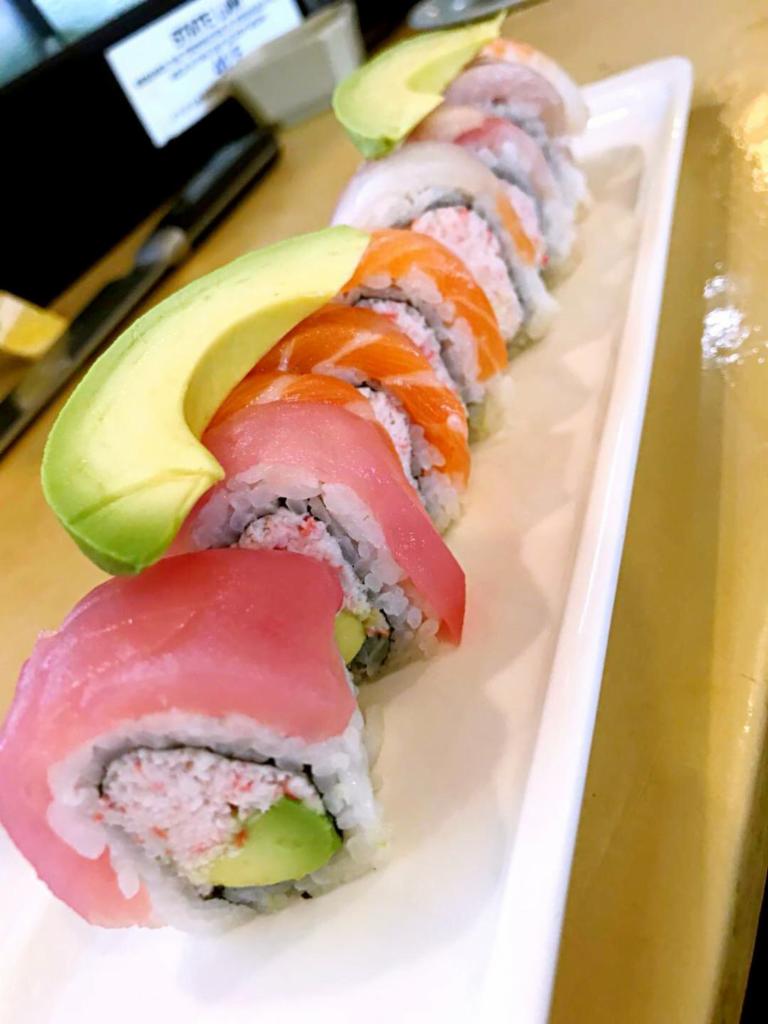 Rainbow Roll · In: Crab and avocado. Out: Tuna, salmon, snapper, shrimp and albacore. Raw.