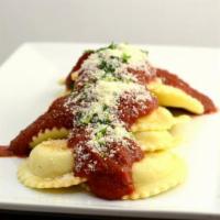 5 Piece Cheese Ravioli · Pasta pockets filled with ricotta cheese, topped with marinara sauce and mozzarella cheese.