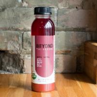 Earthy + Essential · Organic apple, carrot, orange, beet, and ginger.