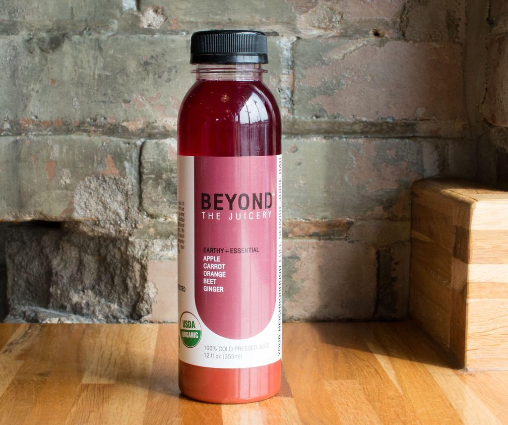Earthy + Essential · Organic apple, carrot, orange, beet, and ginger.
