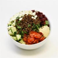 Hummus and Beet Bowl · Quinoa, kale, beets, grape tomato, cucumber, hummus, feta cheese and red wine vinaigrette dr...