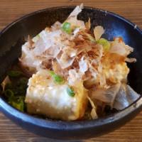 Agedashi Tofu · Lightly battered fried Japanese tofu in Tsuyu broth, grated daikon. Topped with bonito flake...