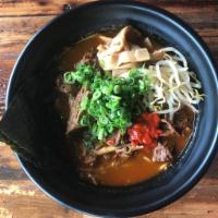 Spicy Miso Beef Stew · Slow cooked beef frank with spicy miso, Japanese bamboo, sesame seeds, scallion, beansprouts...