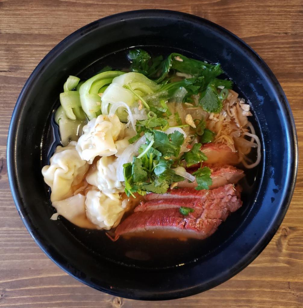 Mi Wonton (Mi HoanhThan) · Pork and shrimp dumpling and ramen noodle with bok choy, sliced roasted pork and fried garlic in aromatic chicken broth. Served with fresh bean sprouts, basil leaves and wedge of lime on the side. Contains egg.