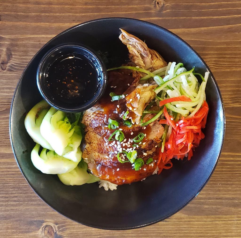 Roasted Duck Rice Bowl · Roasted duck, bok choy, cucumber and pickle ginger. Sprinkled with sesame seeds and scallion. Served with hot sweet soy sauce.