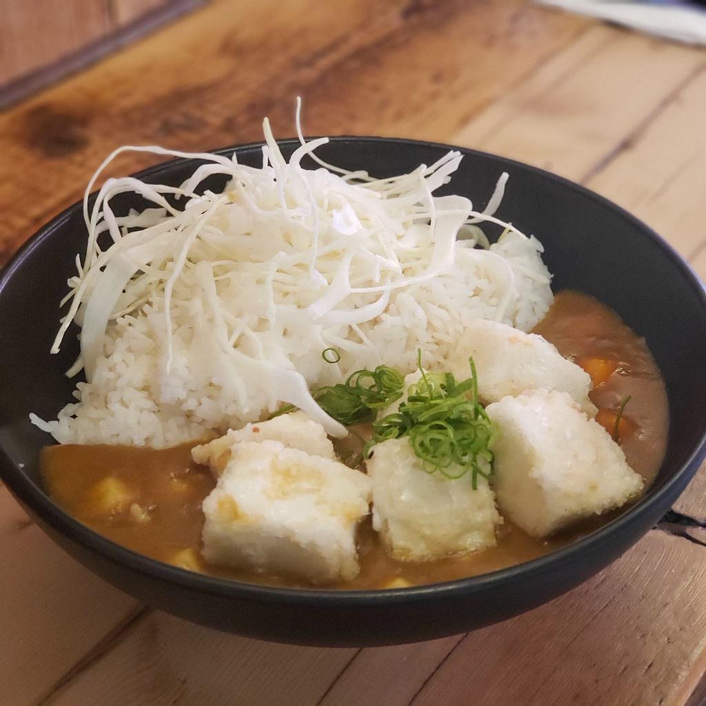 Tofu Katsu Curry · Lightly battered fried Japanese tofu, carrot, potato, onion, cabbage and scallions in mild curry sauce.