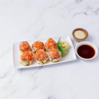 Volcano Roll · Grilled Chilean sea bass, caviar, spicy crab, caviar, avocado, deep fried topped with spicy ...