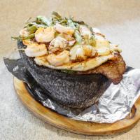Molcajete Special Fajita · Steak, grilled chicken, shrimp and chorizo, sauteed with onions, bell peppers and tomatoes, ...