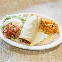 Chimichanga · We stuff a flour tortilla with your choice of chunks of beef or spicy chicken, then deep fry...