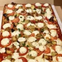 Eggplant Delight Pizza · Chunks of eggplant, tomatoes, ricotta cheese and mozzarella cheese.