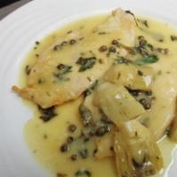 Chicken Piccata · Cutlet with capers, artichoke hearts in white wine lemon sauce. Served with choice of pasta ...