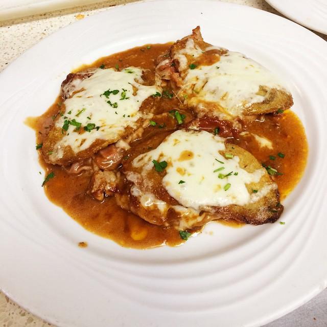 Veal Sorrentino · Cutlet layered with eggplant, prosciutto, mozzarella and light Marsala sauce. Served with choice of pasta or salad. 
