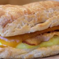Build Your Own Breakfast Sandwich · Egg patty, choice of meat, choice of cheese on choice of English muffin, croissant or bagel.