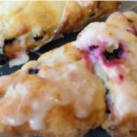 Huckleberry Scone · Soft, moist and sweet house made Huckleberry Scone.